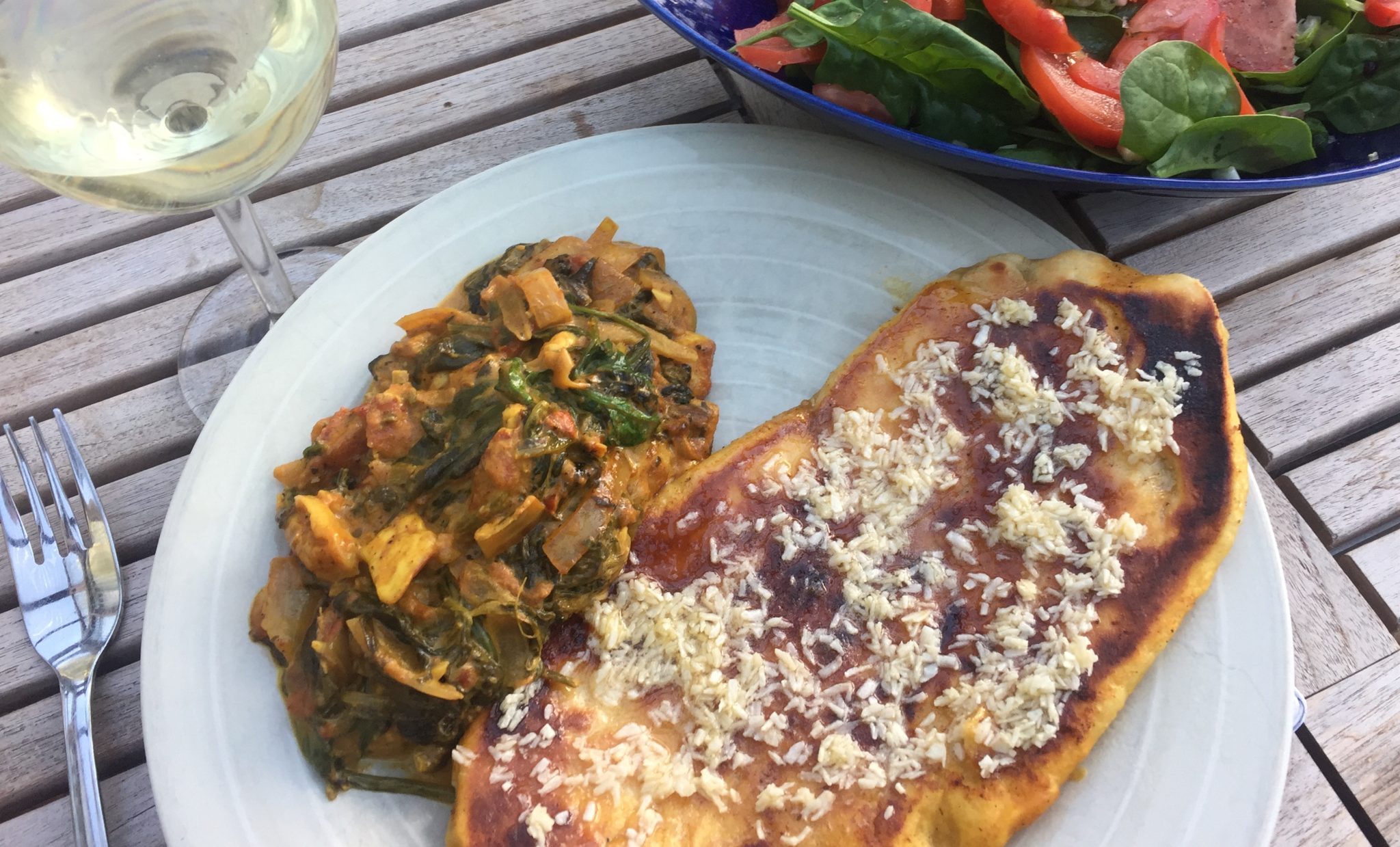 Palak paneer med hällbakat naan